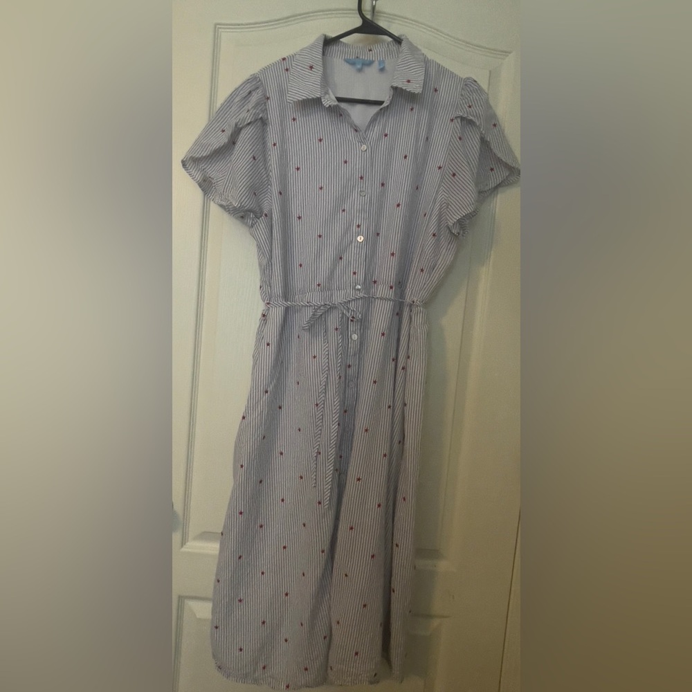 Draper James navy and white striped dress with red stars and tulip sleeves.